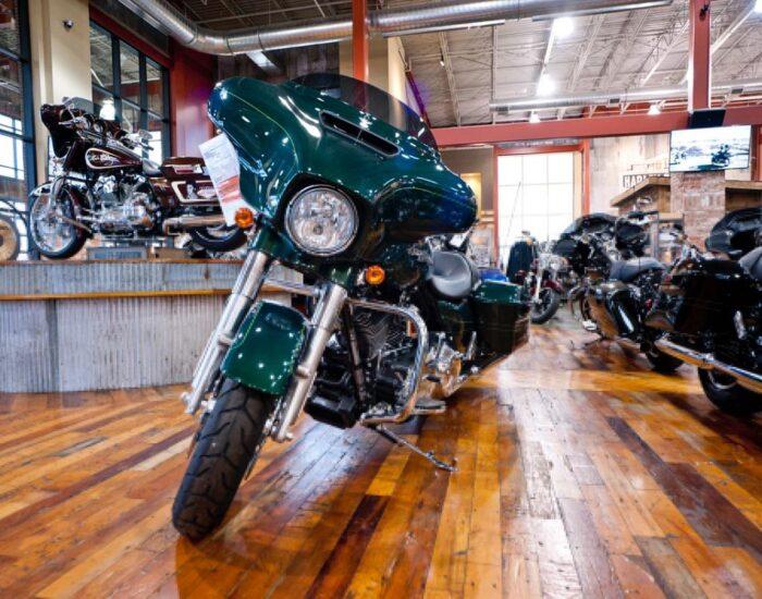 Motorcycles placed on a reclaimed hardwood flooring at the Harley Davidson showroom in Southaven, MS