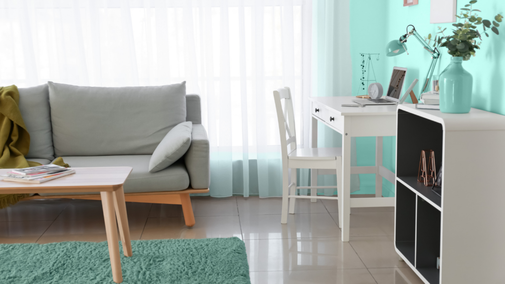 Modern room featuring turquoise walls and carpet