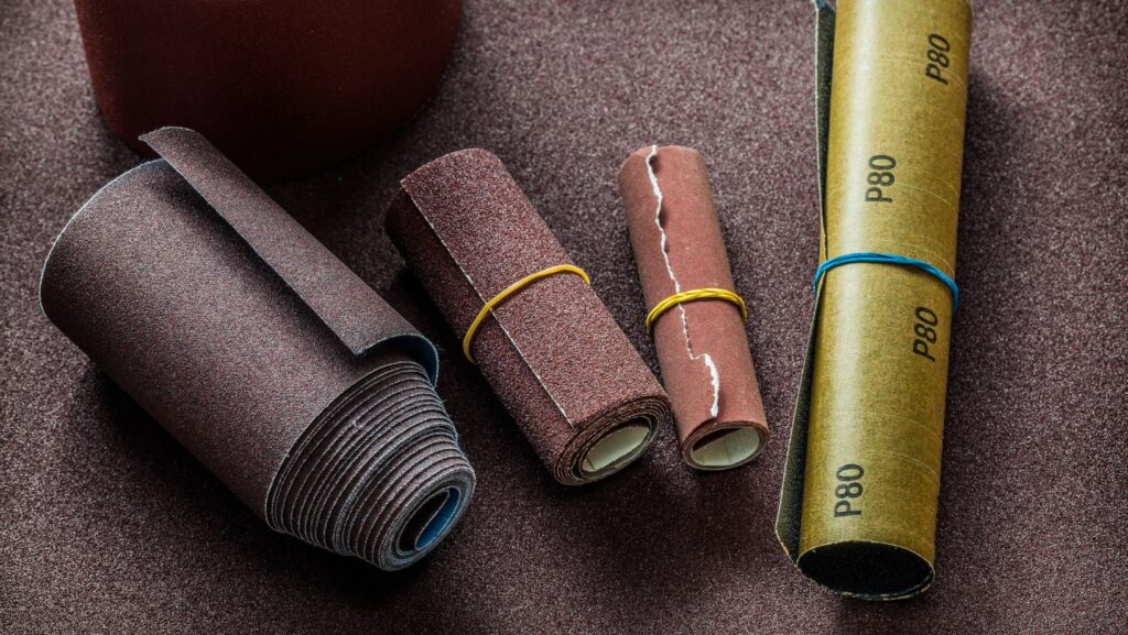 Four different sandpaper rolls