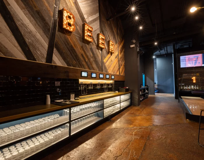 A bar with beer on the wall.