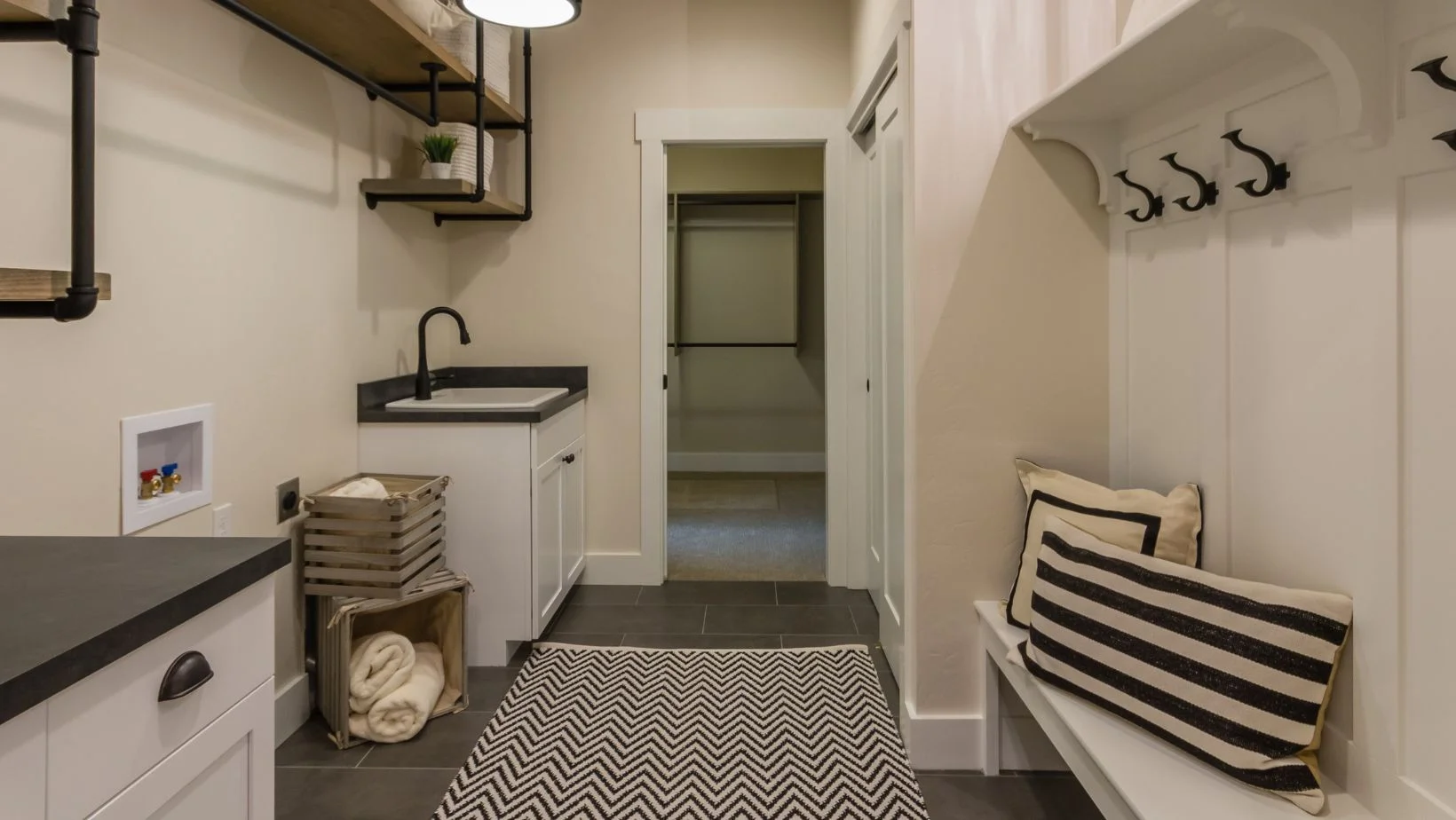 Spectacular mud room entry with bench and laundry