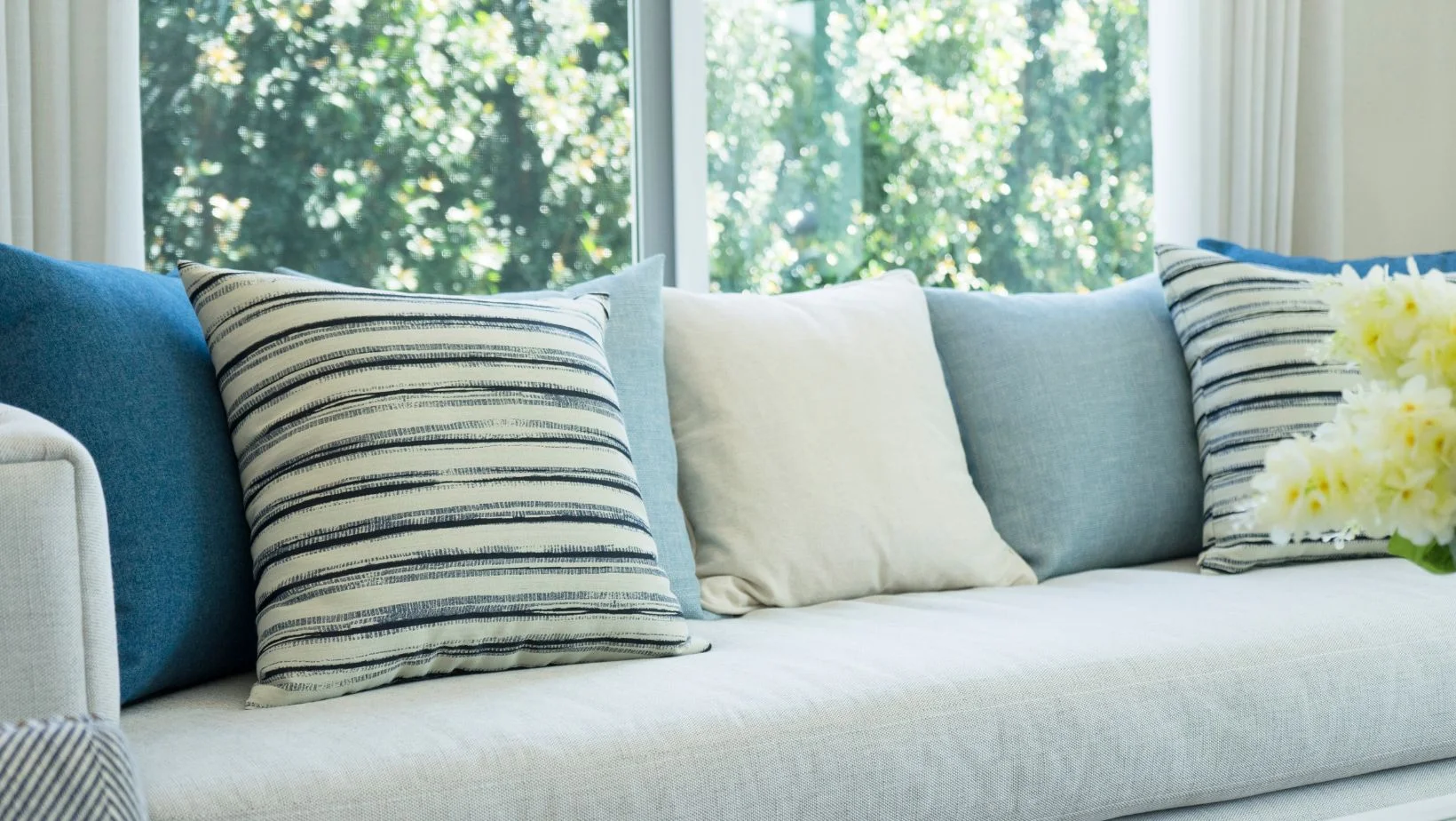 blue and white cozy sofa